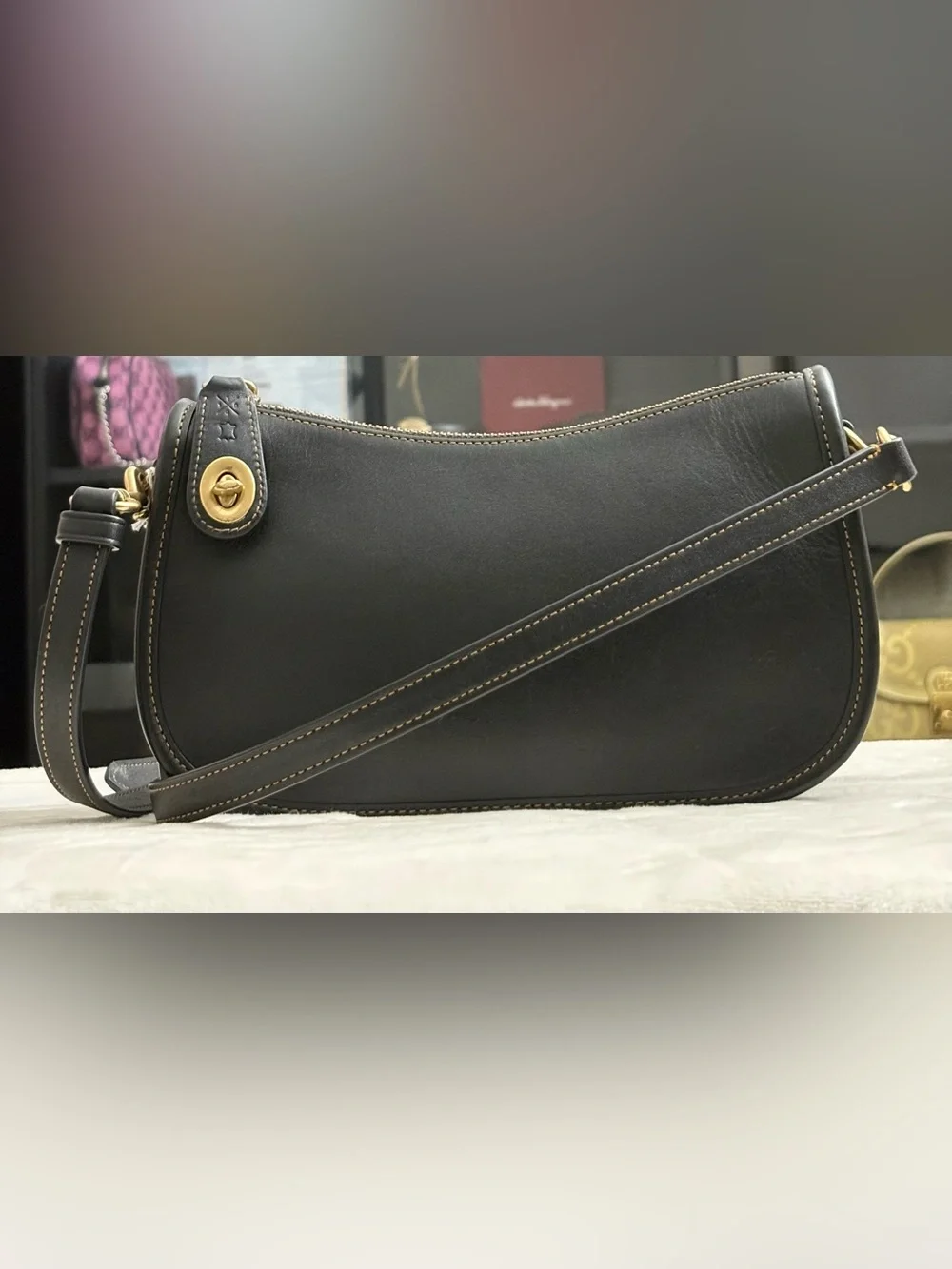 Coach Black Swinger Glove-Tanned Leather Crossbody Bag.